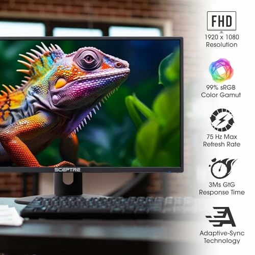 Colorful chameleon displayed on a computer monitor with specifications including FHD resolution, 99% sRGB color gamut, 75Hz refresh rate, 3ms response time, and adaptive-sync technology.
