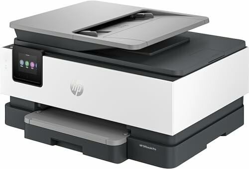 A modern multifunction printer in black and white.
