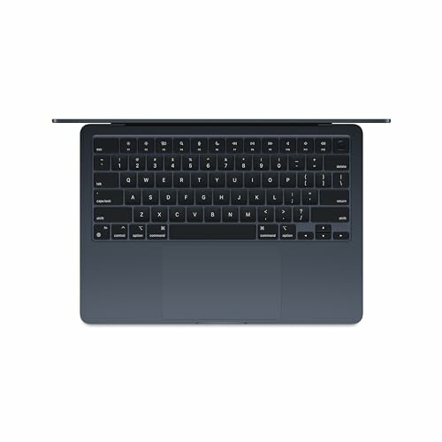 Top view of a laptop keyboard and touchpad.